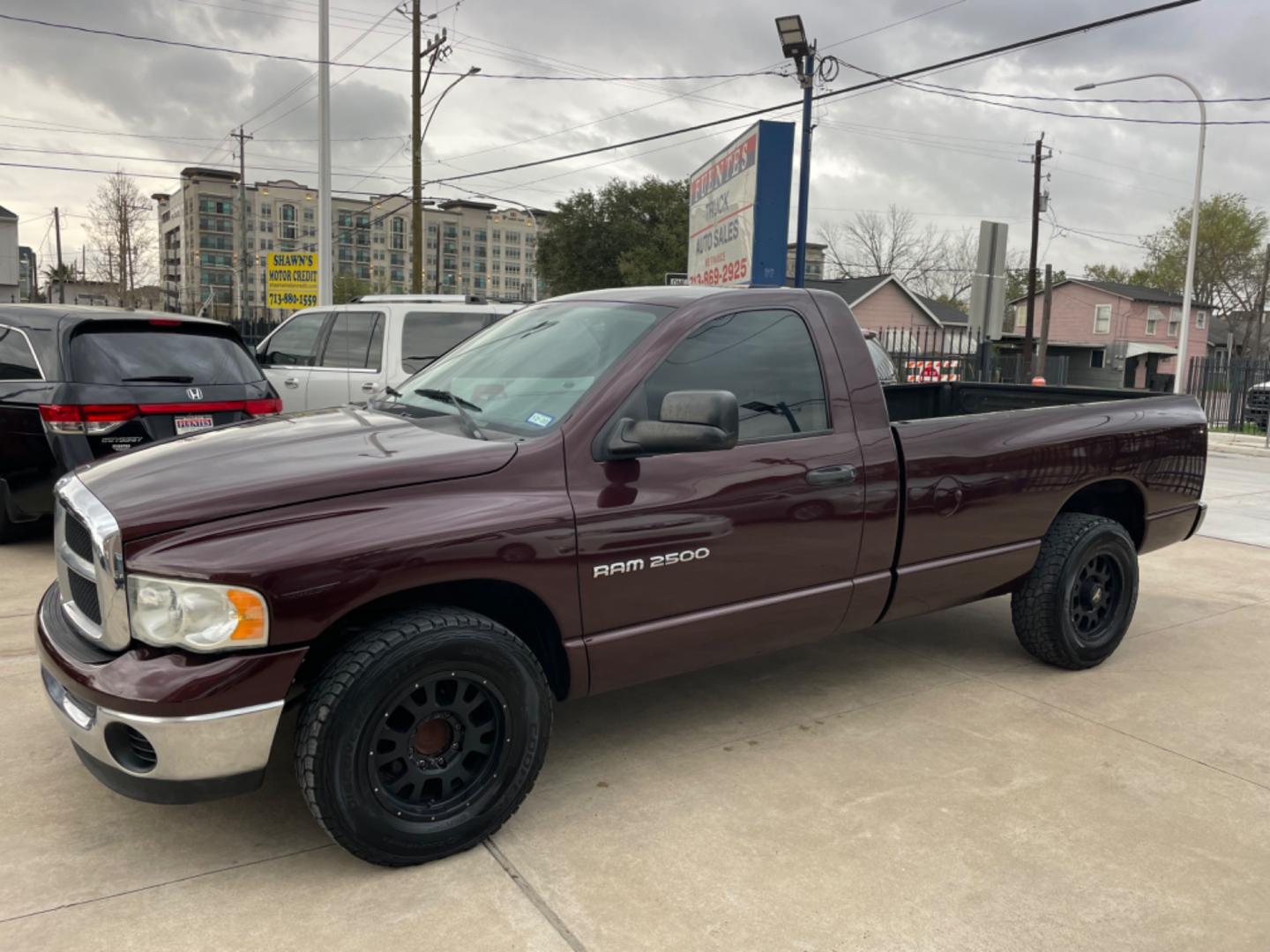 2004 Maroon /Black Dodge Ram 2500 Laramie 2WD (3D7KA26C44G) with an 5.9L L6 OHV 24V TURBO DIESEL engine, Automatic transmission, located at 1501 West 15th St., Houston, 77008, (713) 869-2925, 29.797941, -95.411789 - Photo#0